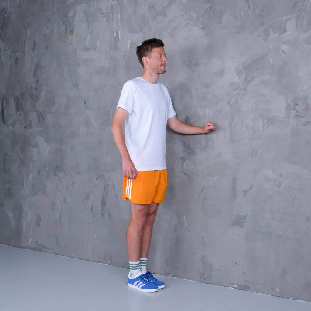 Stå med træningsarmen